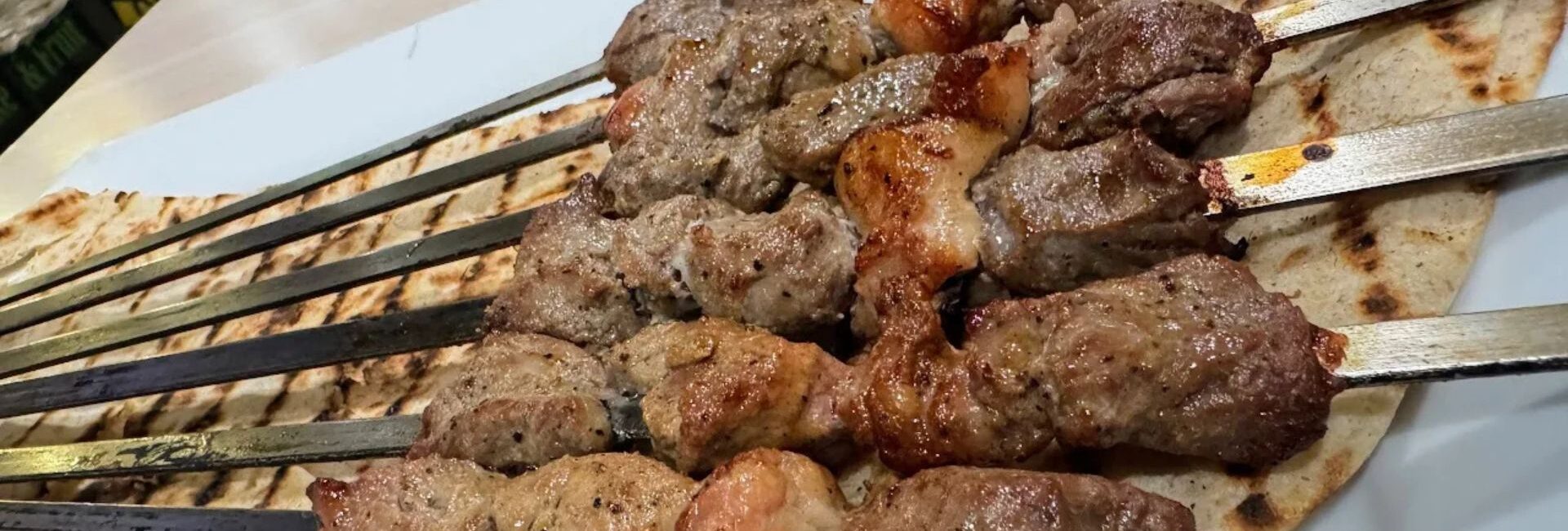 Grilled Afghan kebabs served at Wings Kebab in Plano, TX
